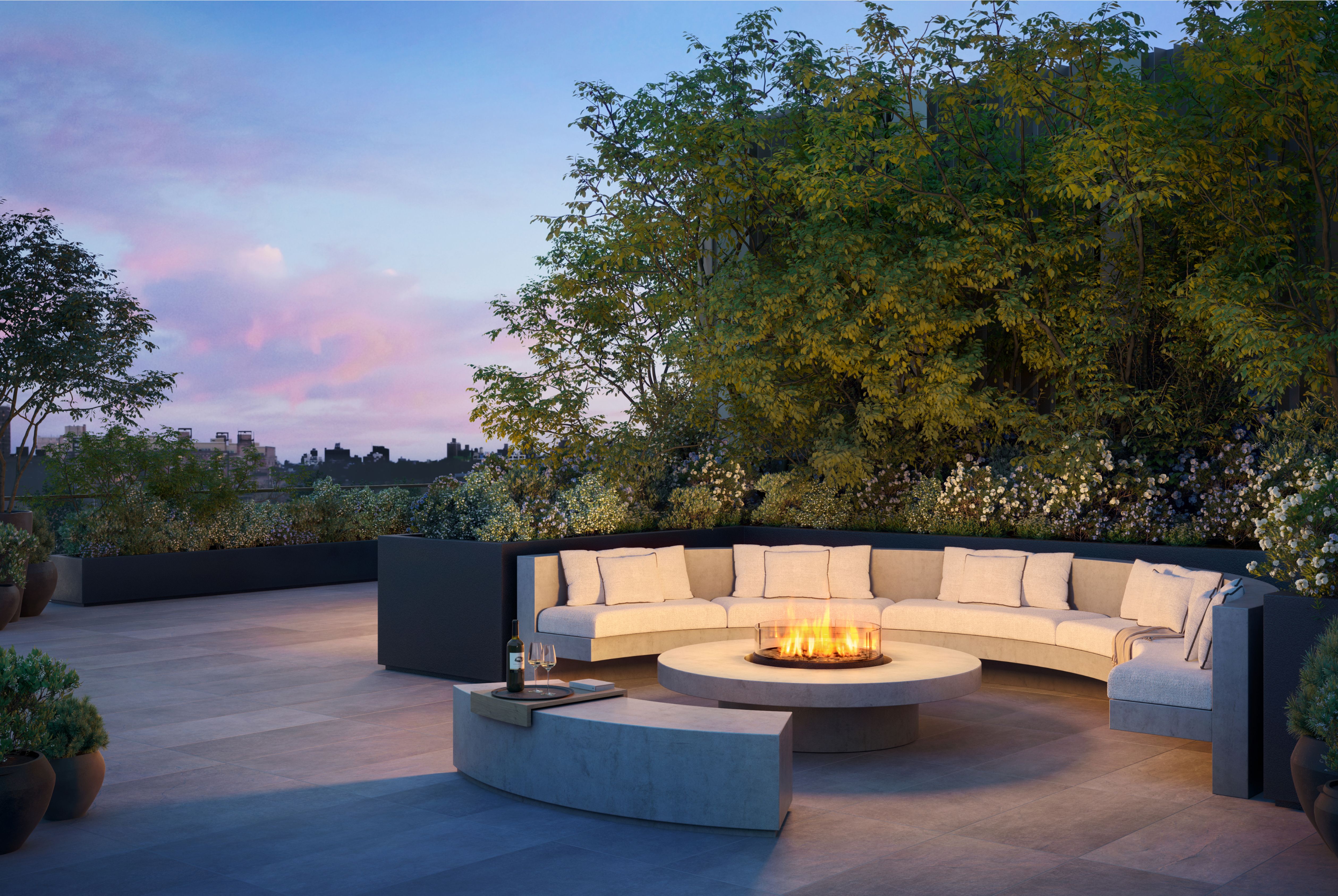 Elegant firepit with seating on the elevated terrace at One Williamsburg Wharf.