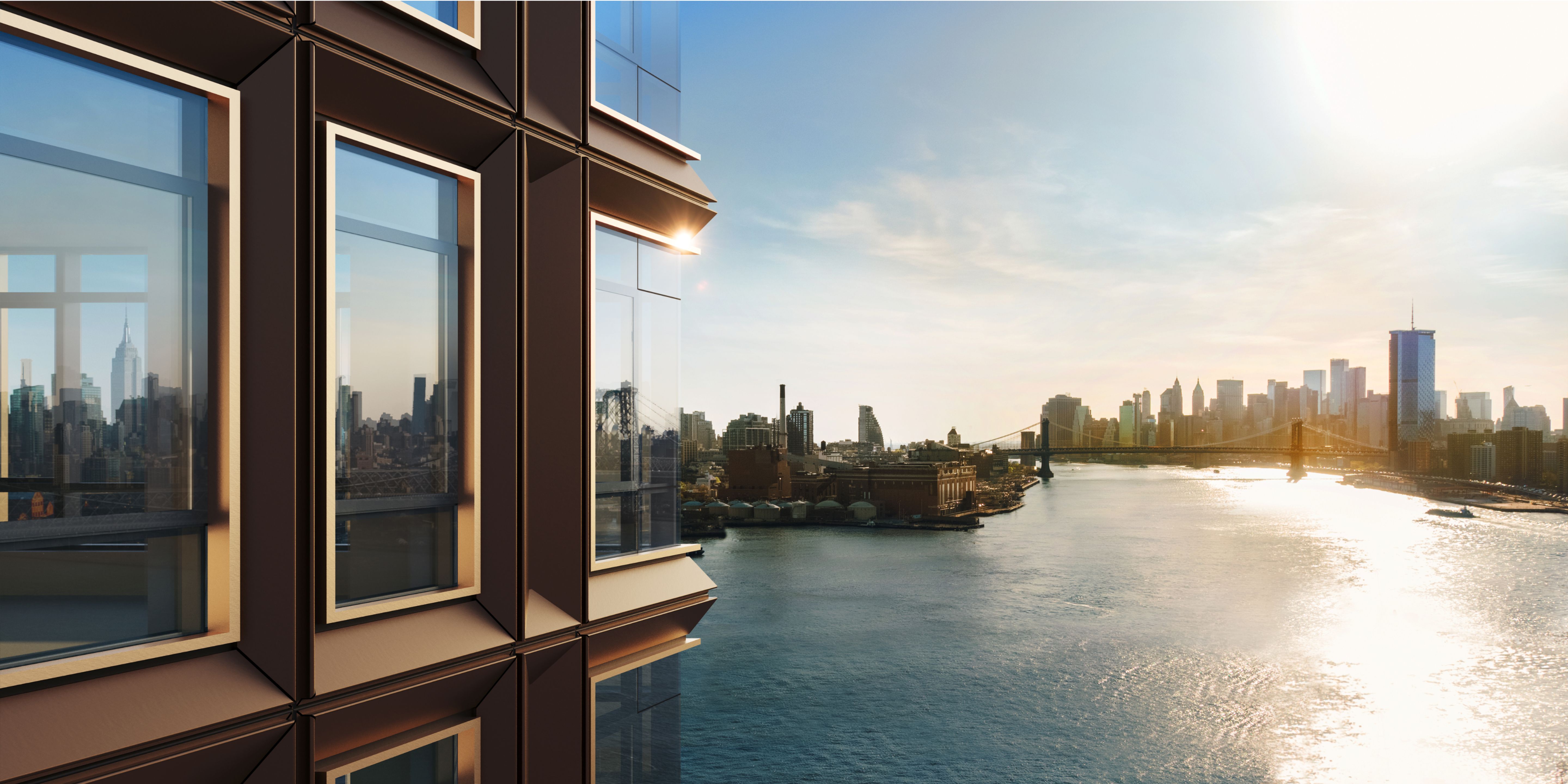 Williamsburg condominiums with floor-to-ceiling windows and East River views at One Williamsburg Wharf.